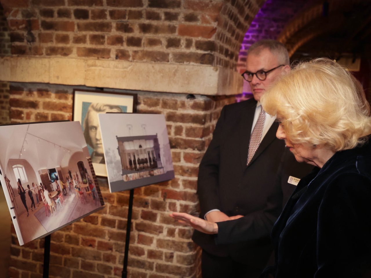 Her Majesty being shown drawings of the proposed restoration works to Smith Square Hall. Image: Andrew Parsons